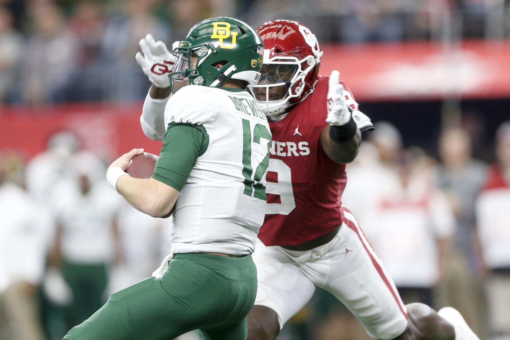 Guerin Emig: Sooners spill blood, guts all over Jerry World, win Big 12 title for their effort